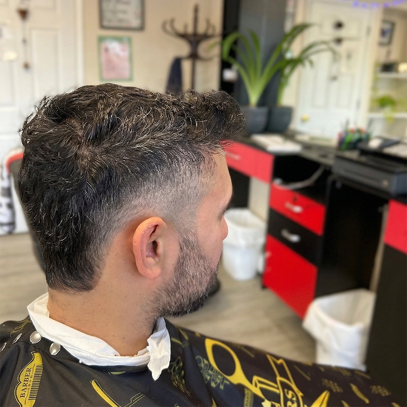 Customer after haircut mirror reflection